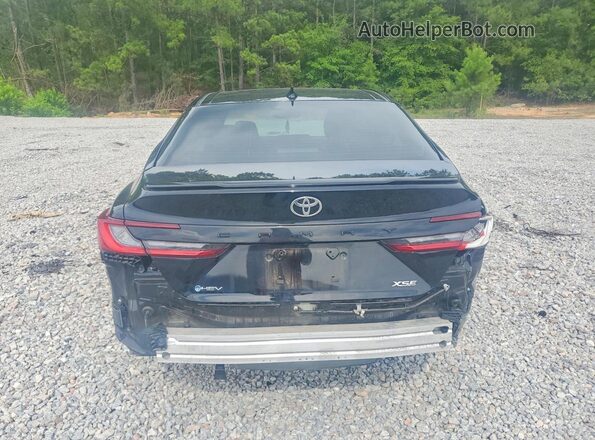 4T1DAACK9TU218853 2026 TOYOTA CAMRY Black Rear view