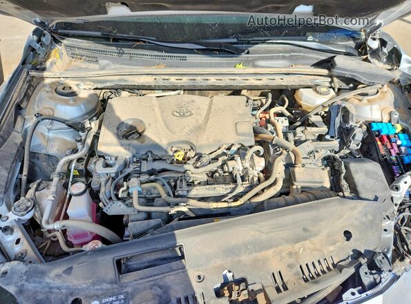 4T1DAACKXSU070484 2025 TOYOTA CAMRY Silver Widok wnętrza z tyłu