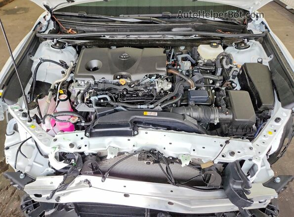 4T1DAACKXTU711425 2026 TOYOTA CAMRY White Rear interior view