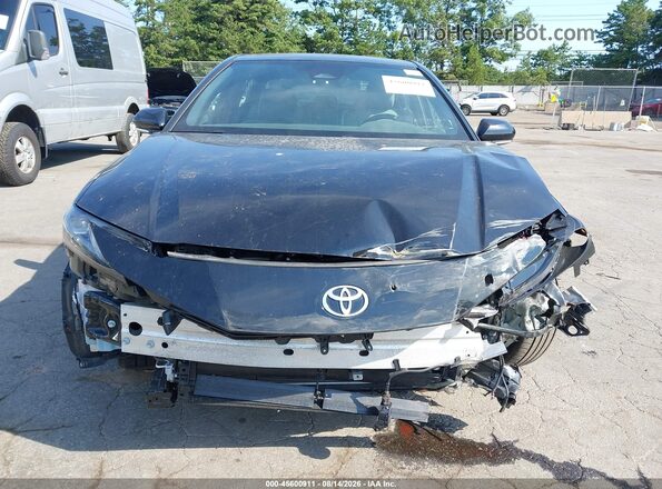 4T1DBADK7SU035610 2025 TOYOTA CAMRY Black Սալոնի հետևի տեսք