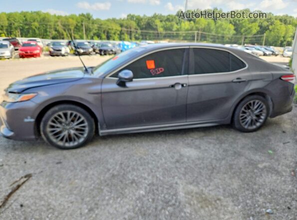 4T1G11AK8LU884103 2020 TOYOTA CAMRY Gray Widok wnętrza z przodu