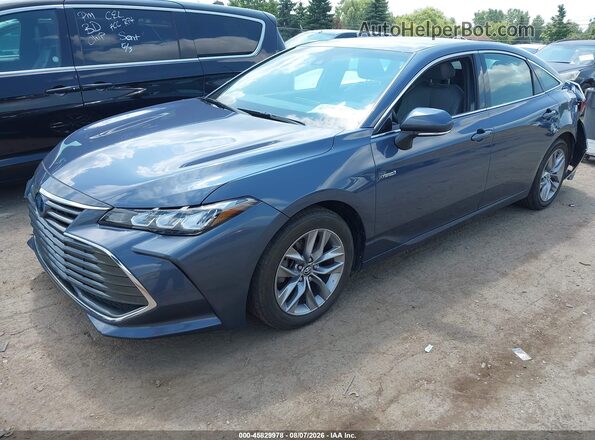 4T1J21FB3LU013590 2020 TOYOTA AVALON HYBRID Gray Vista tres cuartos delantera izquierda