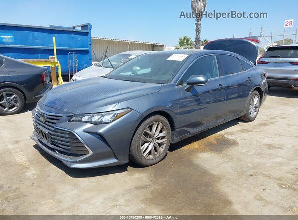 4T1JZ1FB7NU087349 2022 TOYOTA AVALON Gray Vista tres cuartos delantera izquierda
