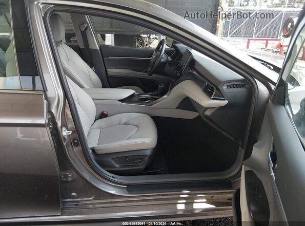 4T1K31AK0RU071660 2024 TOYOTA CAMRY HYBRID Серый Вид салона спереди