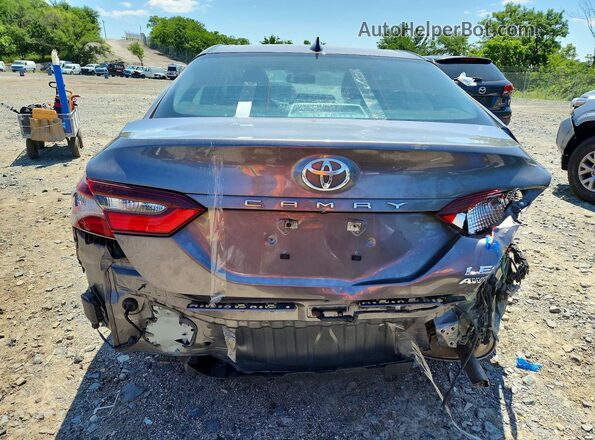 4T1R11BK4PU080653 2023 TOYOTA CAMRY Gray Rear view