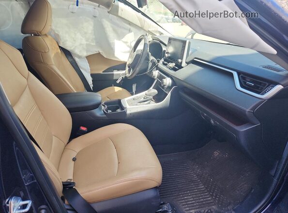 4T3D6RFV2MU055896 2021 TOYOTA RAV4 Blue Front interior view