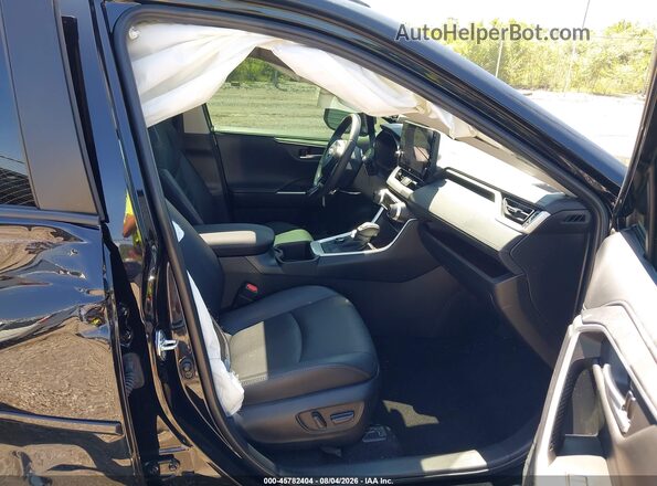 4T3D6RFV7RU141969 2024 TOYOTA RAV4 HYBRID Черный Вид салона спереди