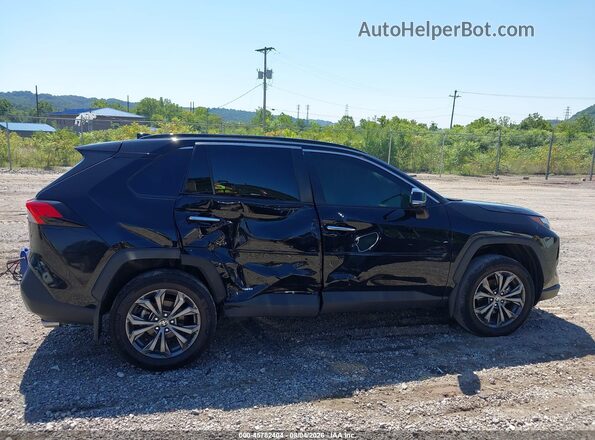 4T3D6RFV7RU141969 2024 TOYOTA RAV4 HYBRID Черный Вид задней части салона