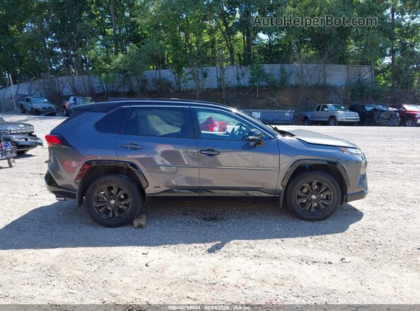 4T3E6RFV3PU119064 2023 TOYOTA RAV4 HYBRID Серый Вид задней части салона
