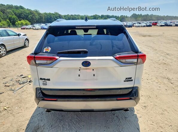 4T3E6RFV5NU076988 2022 TOYOTA RAV4 White Rear view