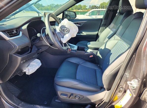 4T3E6RFV9RU174525 2024 TOYOTA RAV4 Gray Vista interior delantera
