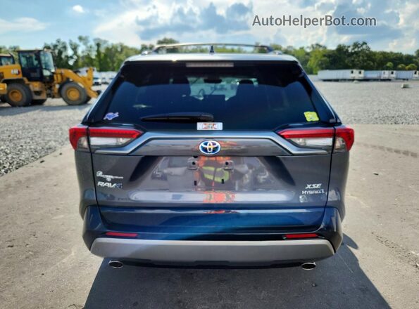4T3E6RFV9RU174525 2024 TOYOTA RAV4 Gray Vista trasera