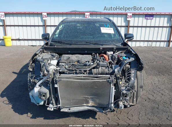 4T3MWRFV1RU139344 2024 TOYOTA RAV4 HYBRID Black Rear interior view