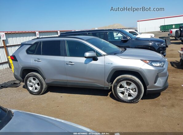 4T3MWRFV2MU037432 2021 TOYOTA RAV4 HYBRID Silver Rear interior view
