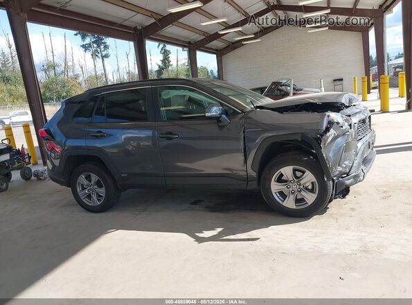 4T3MWRFV6NU069415 2022 TOYOTA RAV4 HYBRID Gray Vista interior trasera