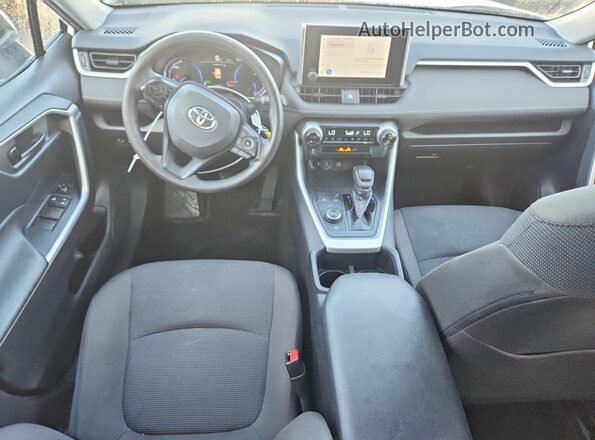 4T3MWRFV9PU088477 2023 TOYOTA RAV4 White Dashboard view