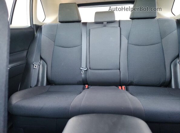 4T3MWRFV9PU088477 2023 TOYOTA RAV4 White Rear seats view