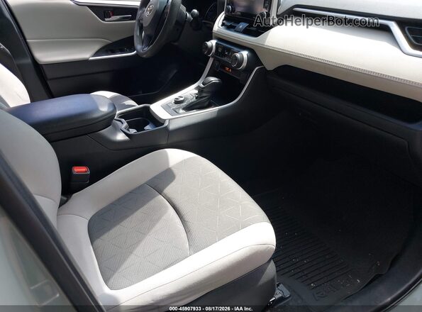 4T3RWRFV0MU026693 2021 TOYOTA RAV4 HYBRID Silver Вид салону спереду