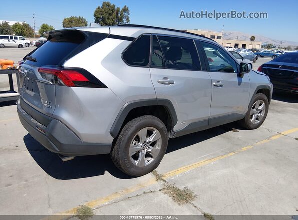 4T3RWRFV4PU103456 2023 TOYOTA RAV4 HYBRID Silver Trasero derecho