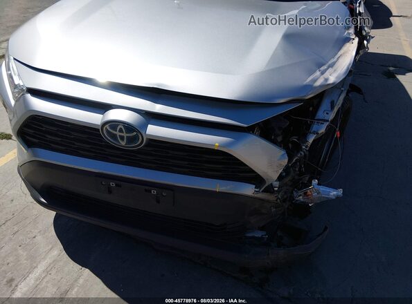 4T3RWRFV4PU103456 2023 TOYOTA RAV4 HYBRID Silver Vista interior trasera