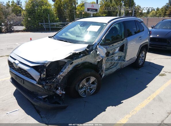 4T3RWRFV4PU103456 2023 TOYOTA RAV4 HYBRID Silver Vista tres cuartos delantera izquierda