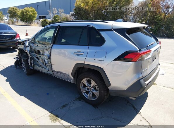 4T3RWRFV4PU103456 2023 TOYOTA RAV4 HYBRID Silver Trasero izquierdo