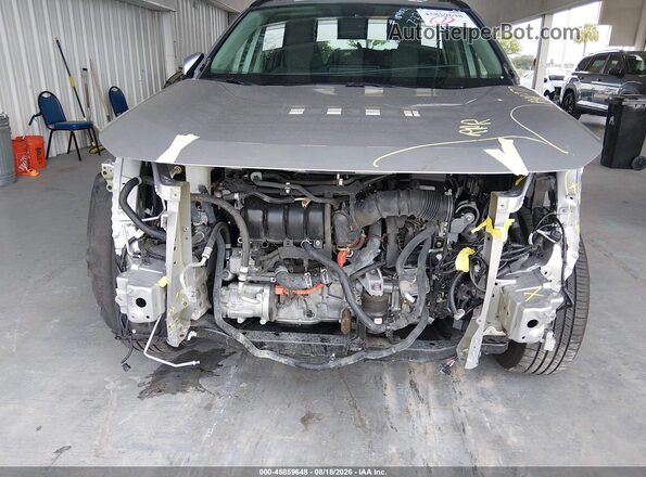 4T3RWRFV6MU017528 2021 TOYOTA RAV4 HYBRID Silver Widok wnętrza z tyłu