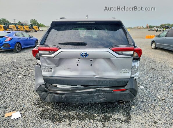 4T3RWRFV6RU132606 2024 TOYOTA RAV4 Silver Rear view
