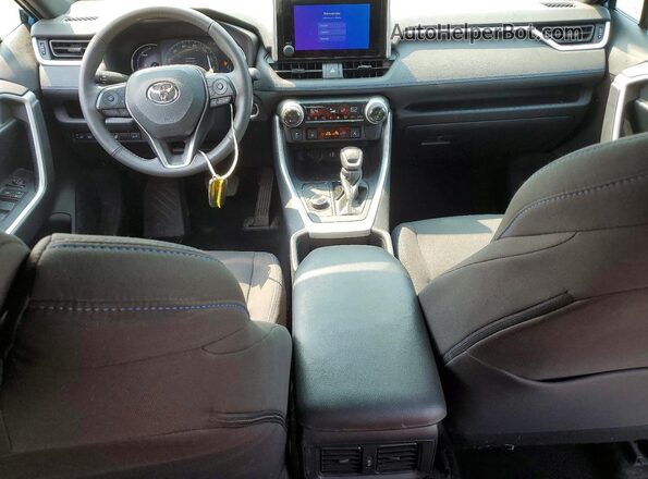 4T3T6RFV9PU139147 2023 TOYOTA RAV4 Синий Вид панели приборов