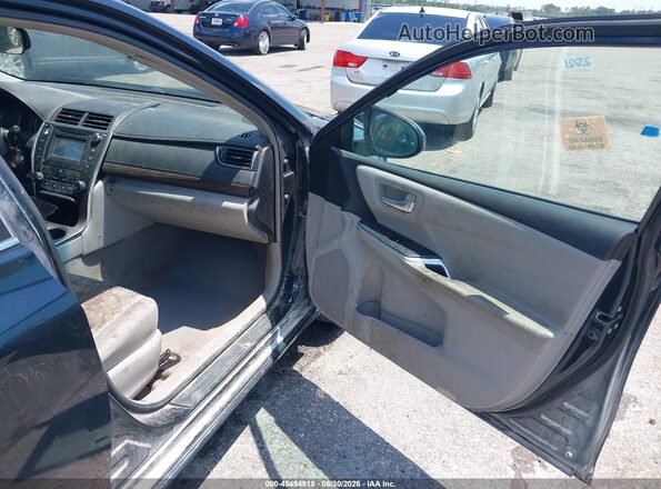 4T4BF1FK3GR559875 2016 TOYOTA CAMRY Black Front interior view