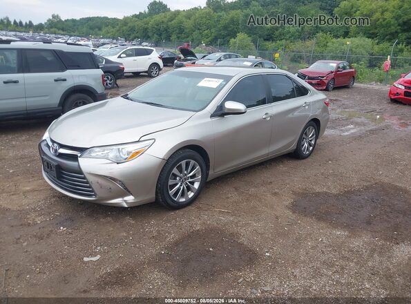4T4BF1FK5GR573891 2016 TOYOTA CAMRY Gold წინა მარცხენა ხედი სამი მეოთხედიდან