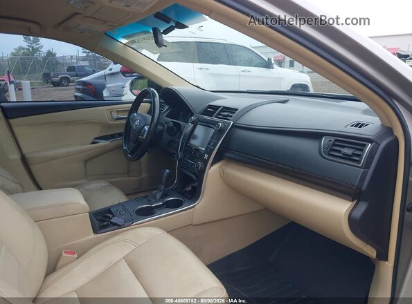 4T4BF1FK5GR573891 2016 TOYOTA CAMRY Gold წინა სალონის ხედი