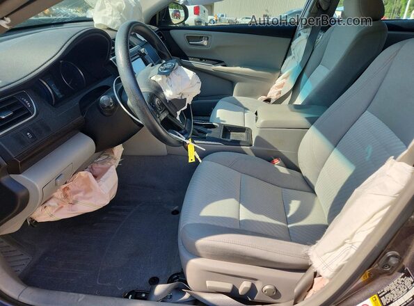 4T4BF1FK6GR526577 2016 TOYOTA CAMRY Серебряный Вид салона спереди