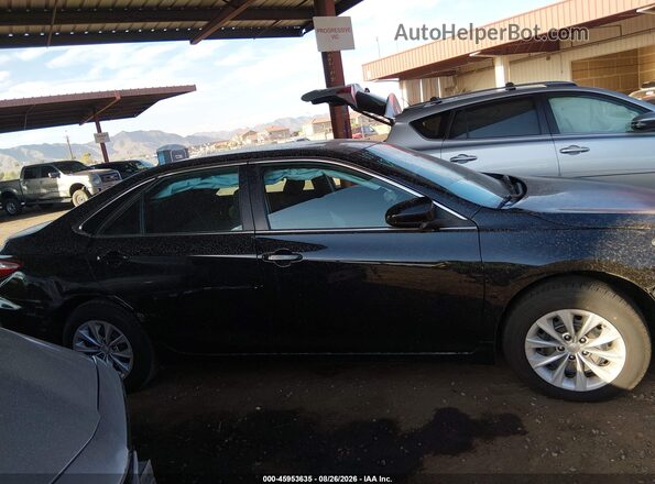 4T4BF1FK8GR572783 2016 TOYOTA CAMRY Black Սալոնի հետևի տեսք