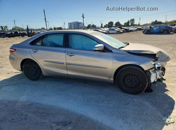 4T4BF1FK8GR580429 2016 TOYOTA CAMRY Tan Առջևի վահանակի տեսք