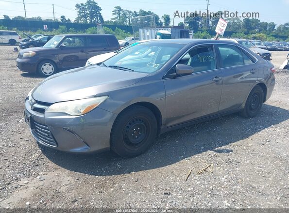 4T4BF1FKXGR570243 2016 TOYOTA CAMRY Gray წინა მარცხენა ხედი სამი მეოთხედიდან