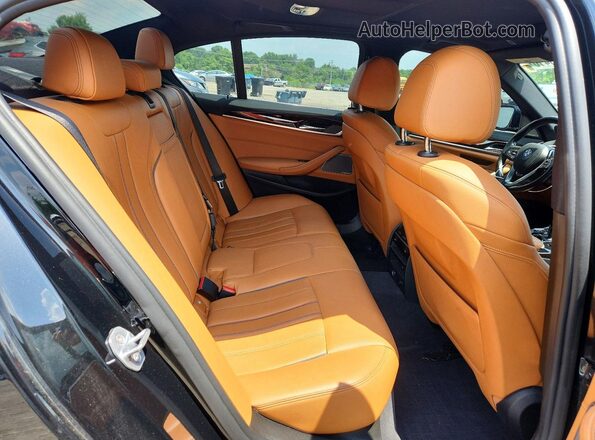 WBAJB1C57JB084753 2018 BMW 5 SERIES Black Vista interior trasera