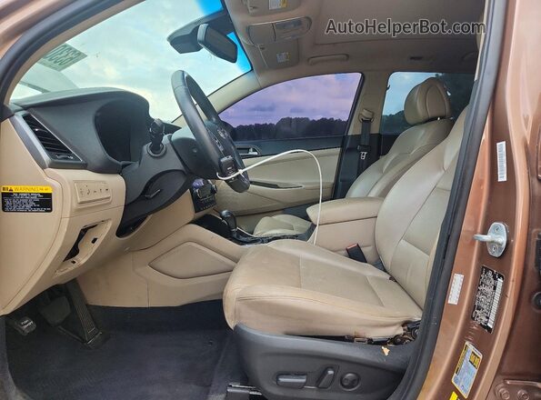 KM8J33A20GU076961 2016 HYUNDAI TUCSON Brown Vista del salpicadero
