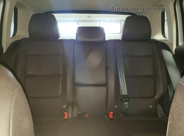 WVGBV7AX0GW604486 2016 VOLKSWAGEN TIGUAN Silver Вид задньої частини салону