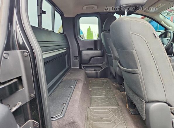 1N6AA1C82HN554077 2017 NISSAN TITAN Black Vista interior trasera