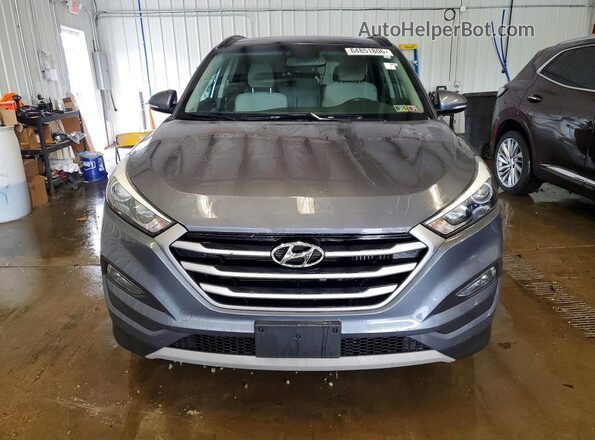 KM8J3CA22JU690014 2018 HYUNDAI TUCSON Gray Вид ззаду