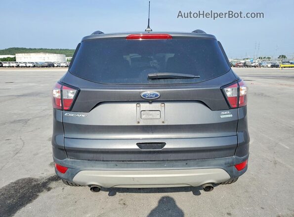 1FMCU0HDXJUC03797 2018 FORD ESCAPE Серый Вид салона спереди
