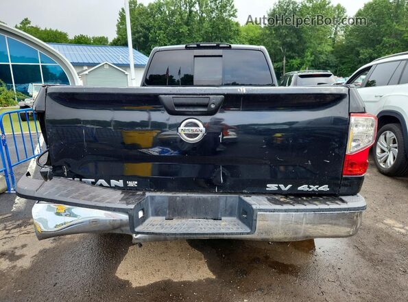 1N6AA1C82HN554077 2017 NISSAN TITAN Black Vista interior delantera
