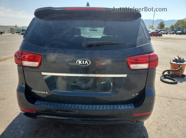 KNDMB5C16G6097676 2016 KIA SEDONA Угольный Вид салона спереди