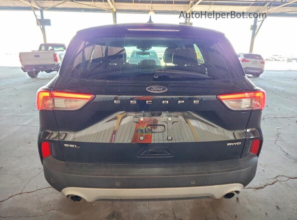 1FMCU9H65MUA64592 2021 FORD ESCAPE Black Widok wnętrza z przodu