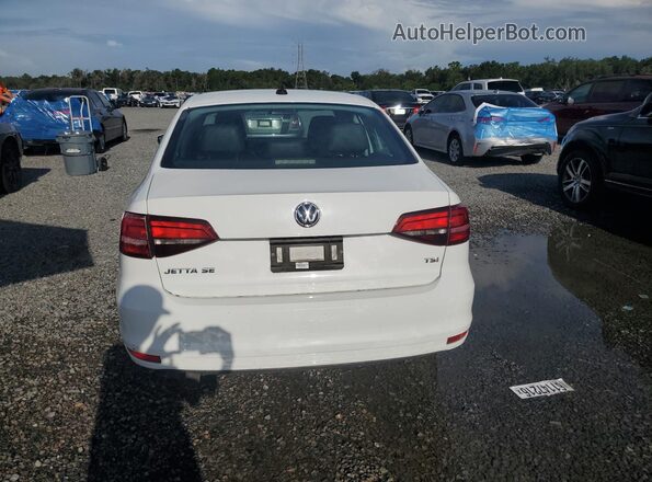 3VWD67AJ5GM402889 2016 VOLKSWAGEN JETTA Белый Вид салона спереди