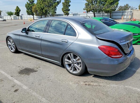 55SWF4HB8JU259634 2018 MERCEDES-BENZ C Gray Trasero izquierdo