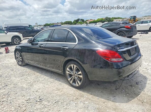 55SWF4JB4HU229793 2017 MERCEDES-BENZ C Black Trasero izquierdo