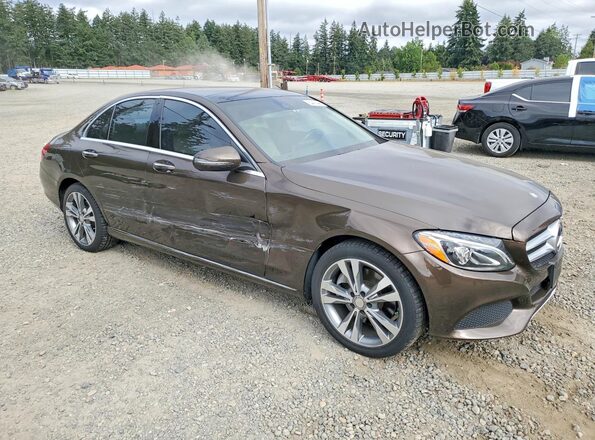 55SWF4KB5GU135077 2016 MERCEDES-BENZ C Коричневый Передняя правая четверть