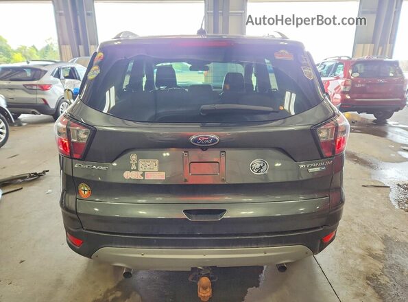 1FMCU9J9XHUE23879 2017 FORD ESCAPE Gray Widok wnętrza z przodu